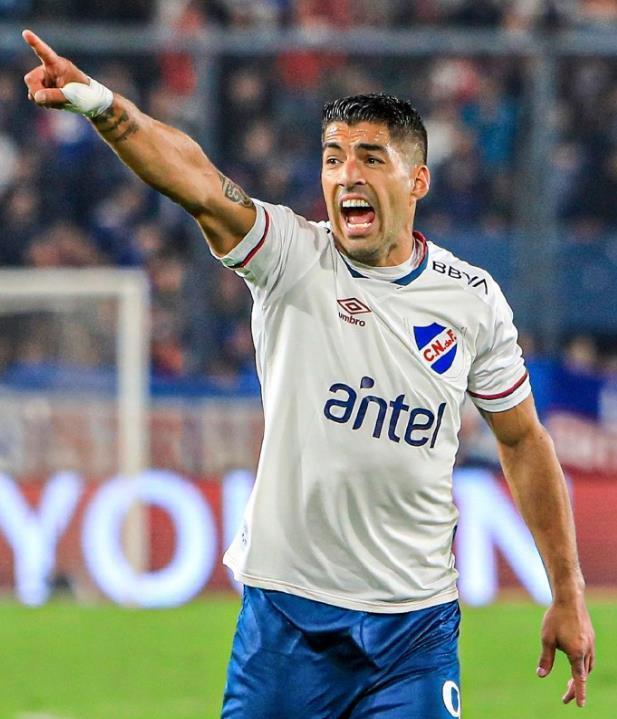 开云体育-乌拉圭爆冷西班牙，苏亚雷斯爆发神勇